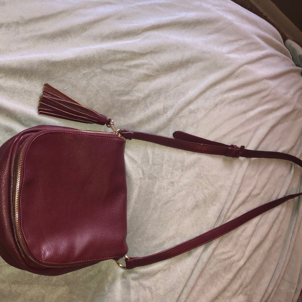 Maroon cross body purse with tassel